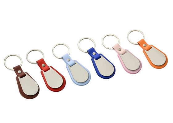سعر جيد Debossed Logo PU Leather Keychain Keyring Edge Coating Metal Key Holder الانترنت